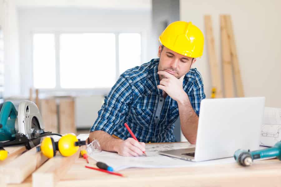 focus-construction-worker-on-construction-site-9JYZ8NP-1 Custom Built Houses Nashville